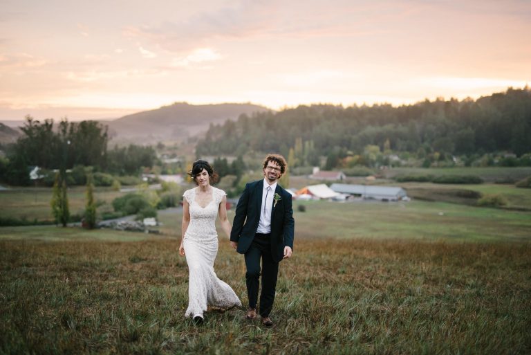 Sonoma County Ranch Wedding Portrait of Couple Walking with Sunset